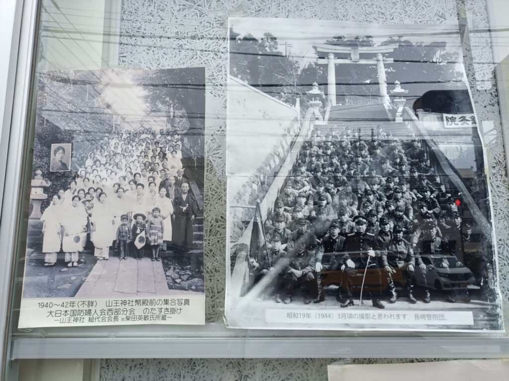 What Happens in Nagasaki on August 9: Inside the Moment of Silence at Sannō Shrine A wartime photograph of Sannō Shrine displayed in the photo studio window