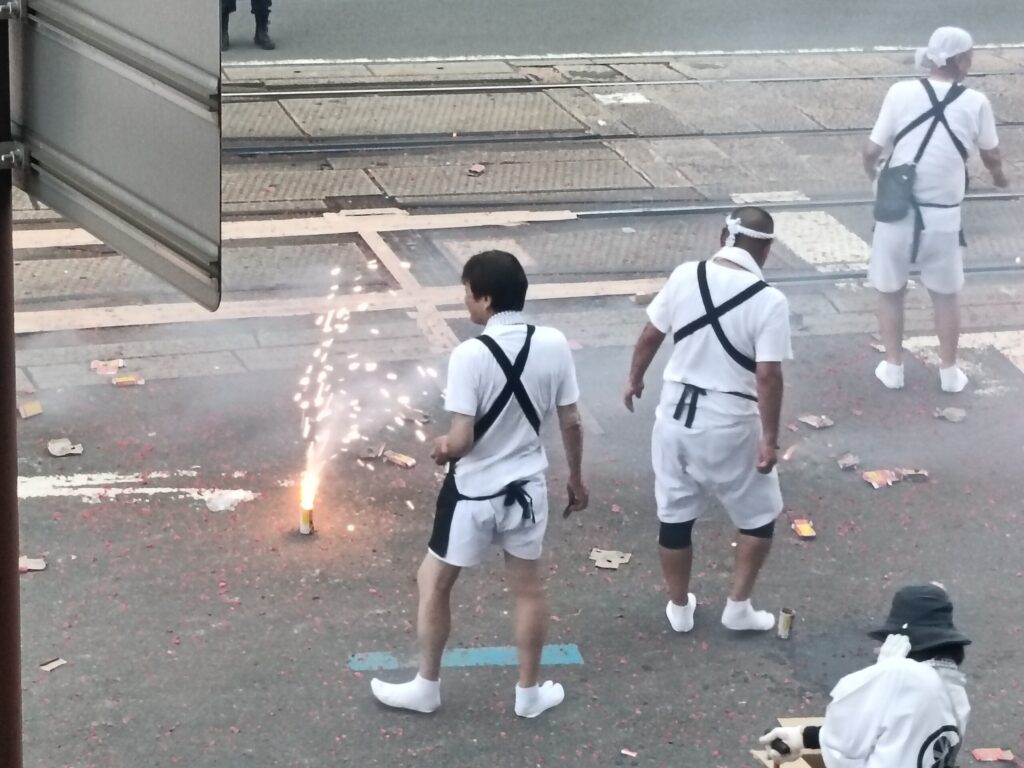 One Night a Year, Firecrackers Take Over the Streets: Nagasaki's Shoro Nagashi Participants set off fireworks all along the route.